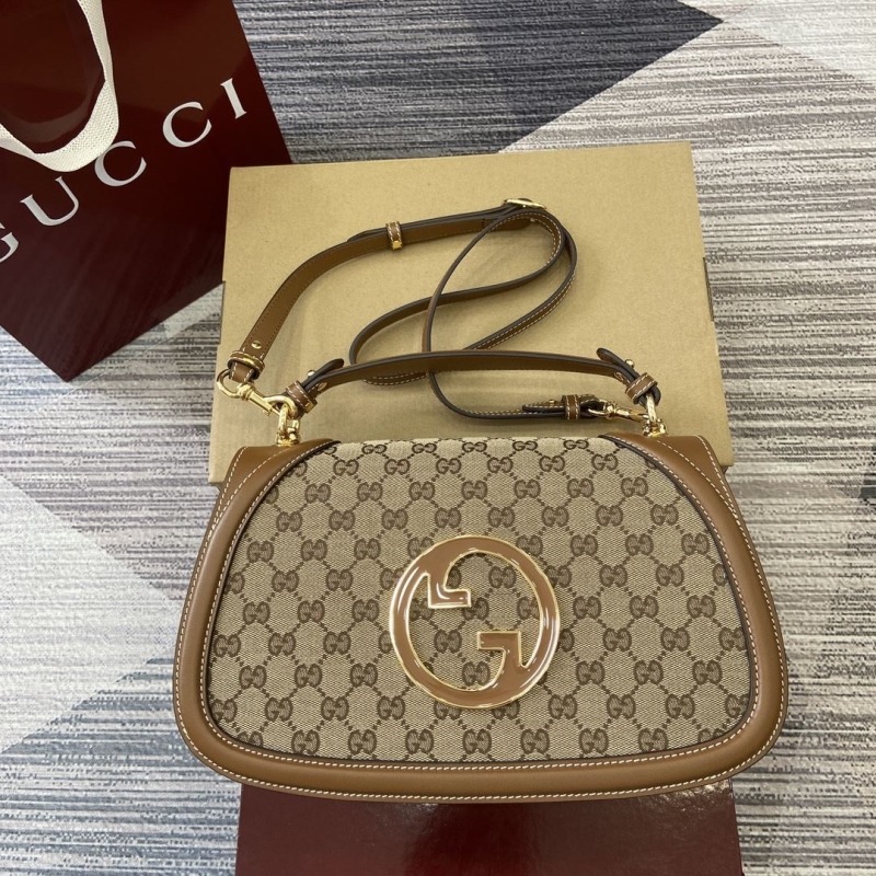 G*u*i top handle bags